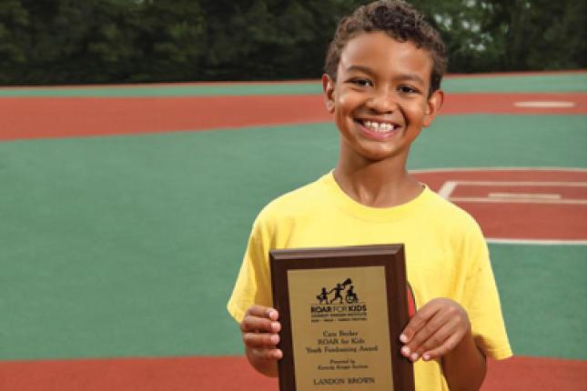 Landon with award