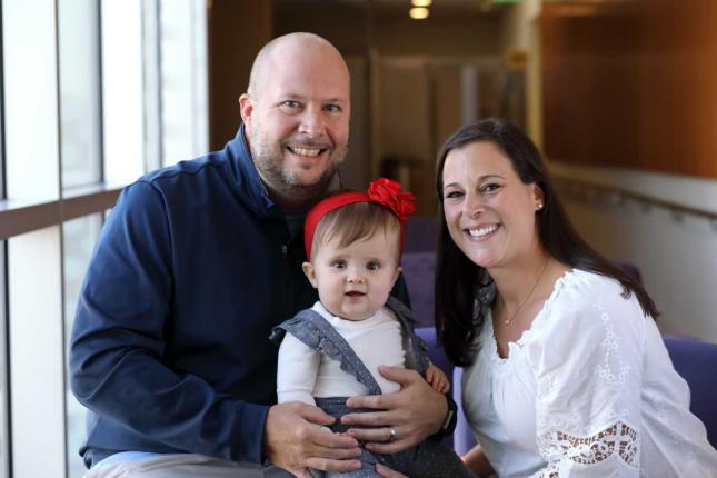 A photo of Josie with her parents