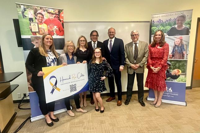 A group of people pose for a photo to commemorate the establishment of the Hannah Rose Culotta Endowed Research Fund. 