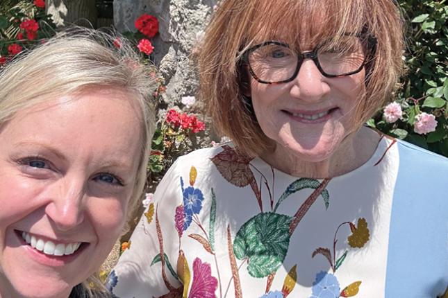 Posed photo of two smiling women.