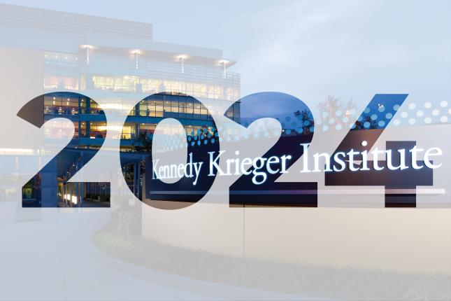 2024 overlayed above an image of the main entrance of Kennedy Krieger Institute's outpatient center.