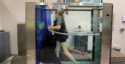 A patient using an underwater treadmill.