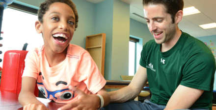 A Phelps Center patient is treated by his therapist. 