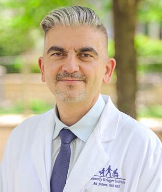 Ali Fatemi headshot.
