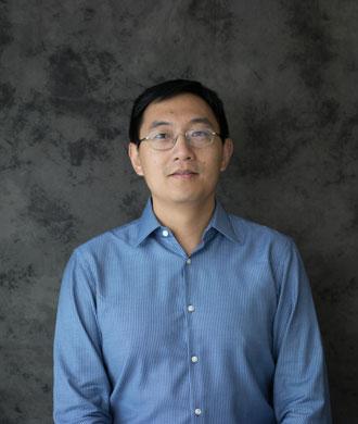 Jun Hua, PhD headshot.