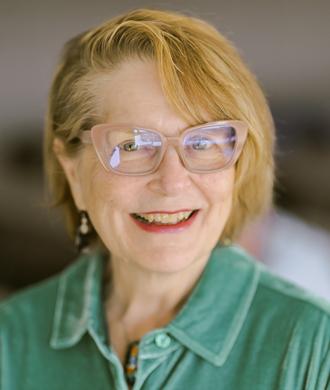 Mary Coster headshot.