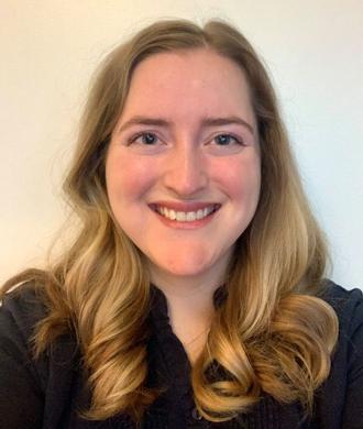 Madison Holmes headshot.