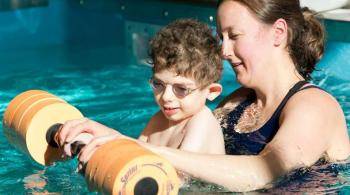 patient and therapist in the therapy pool