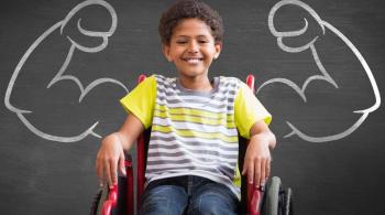 boy in wheelchair with chalk muscles