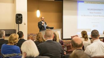 Dr. Bradley Schlaggar speaks to an audience.