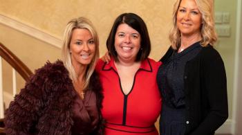 2019 Wine Walkabout Co-chairs, Alex Shek, Shari Tompkins, and Emma Young stand in a line next to each other.