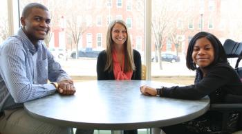A Project HEAL patient and parent with an attorney