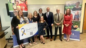 A group of people pose for a photo to commemorate the establishment of the Hannah Rose Culotta Endowed Research Fund. 