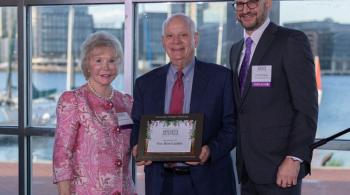 Dr. Nancy Grasmick, senator Ben Cardin and Dr. Bradley Schlaggar stand for a photo at the reception.
