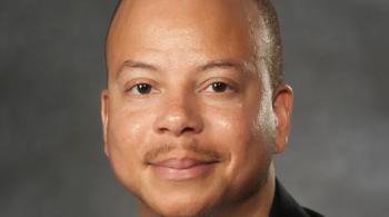 Dr. Natario Couser headshot.