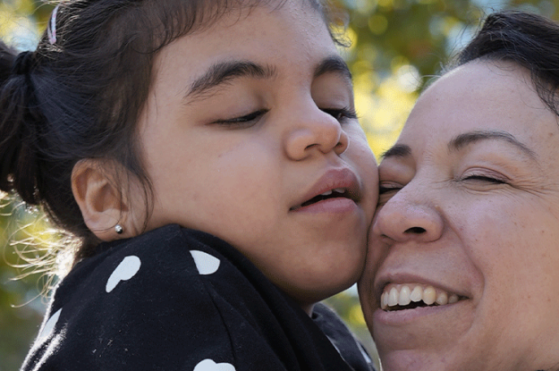 Violet hugs her mom, Inez.