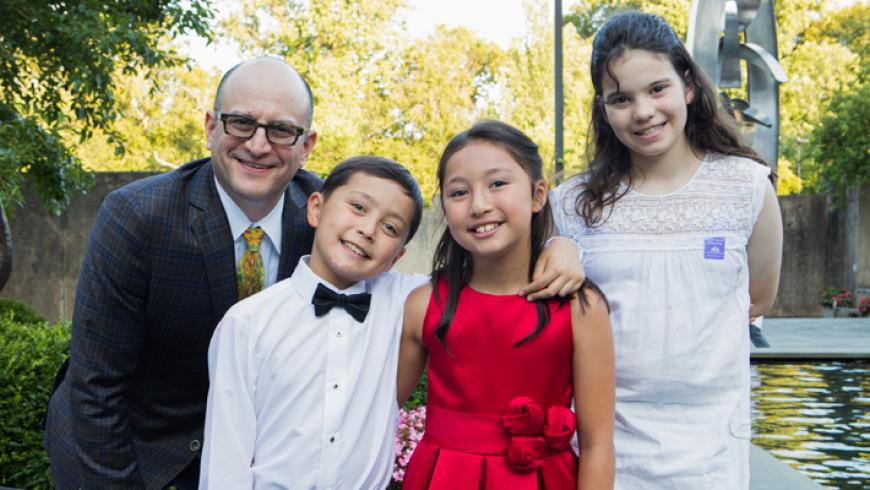 Bradley L. Schlaggar, MD, PhD, president and CEO of Kennedy Krieger; Matthew Schneider; Maggie Schneider; and Lena Schlaggar