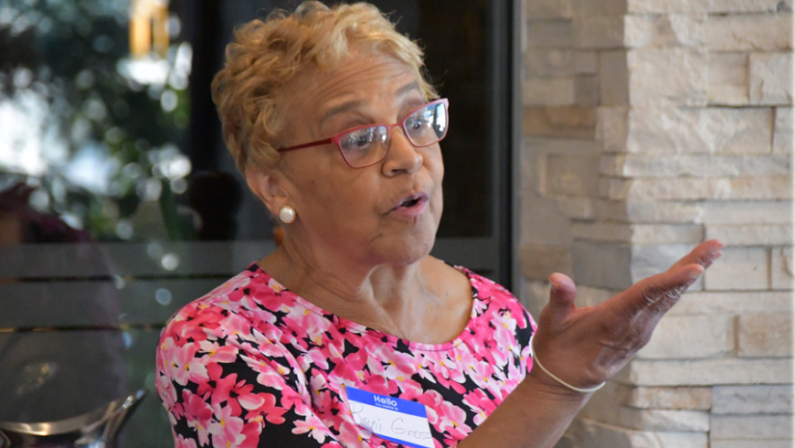 A woman gives a speech at the event. 