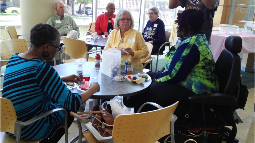 Two tables of attendees. 