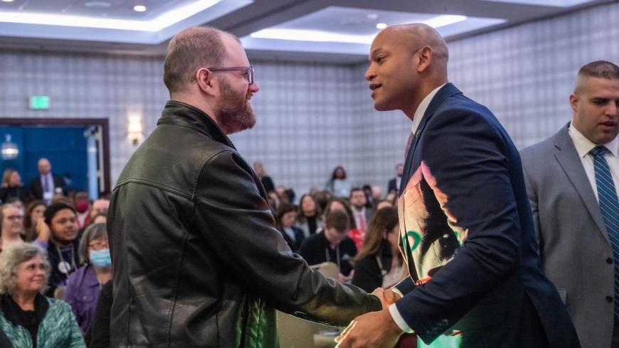 Pictured: Cody Drinkwater and Governor Wes Moore