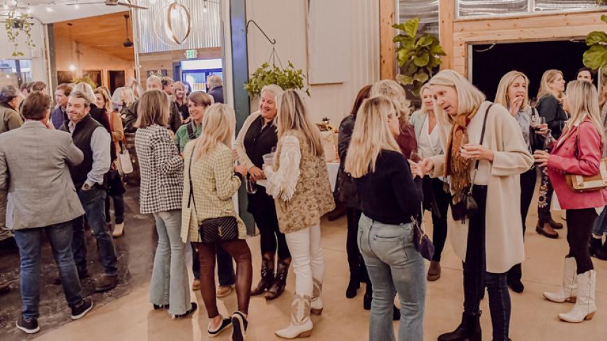 A photo of the crowd inside the taproom at Farmacy Brewing, the venue for Barrels & Bonfires.