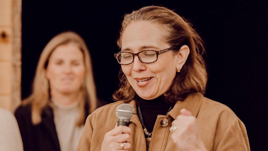 Dr. Carmen Lopez-Arvizu gives a speech at Barrels & Bonfires.