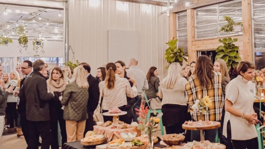 A photo of the crowd inside the taproom at Farmacy Brewing, the venue for Barrels & Bonfires.