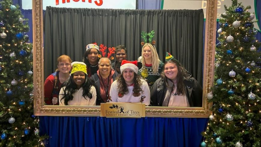 Kennedy Krieger's nursing team poses for a group portrait in the photo booth at Festival of Trees.