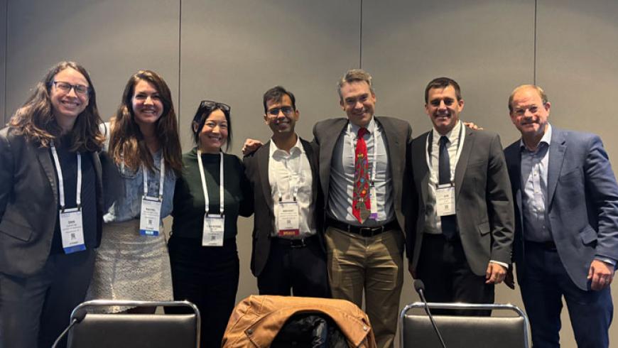 A group of AES Conference 2025 attendees smiling.