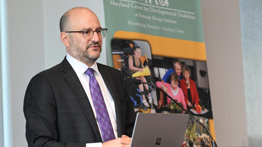 Kennedy Krieger president and CEO Dr. Brad Schlaggar gives a speech at the podium.