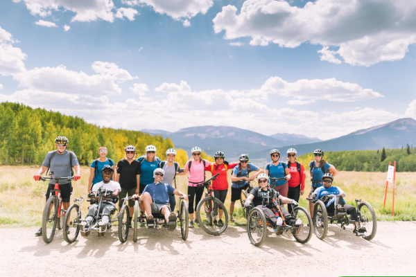 A group of bicyclists and hand cyclists in Colorado.
